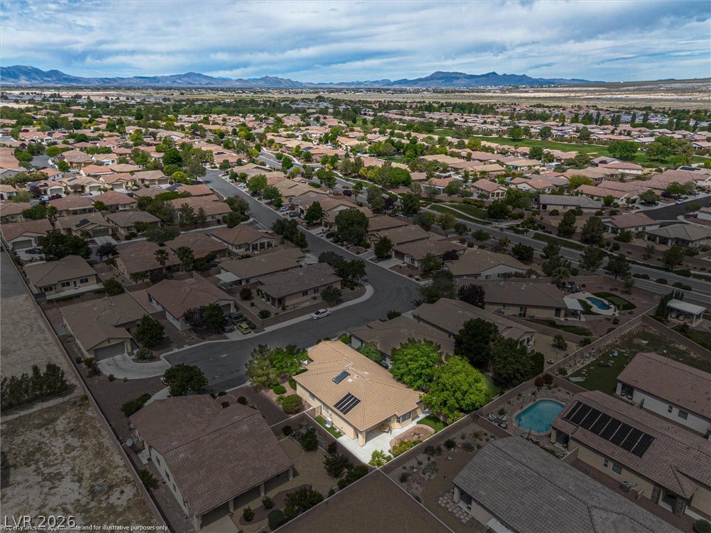 4911 S Castello Way, Pahrump, NV 89061 A quiet suburban neighborhood spreads out toward majestic distant mountains.