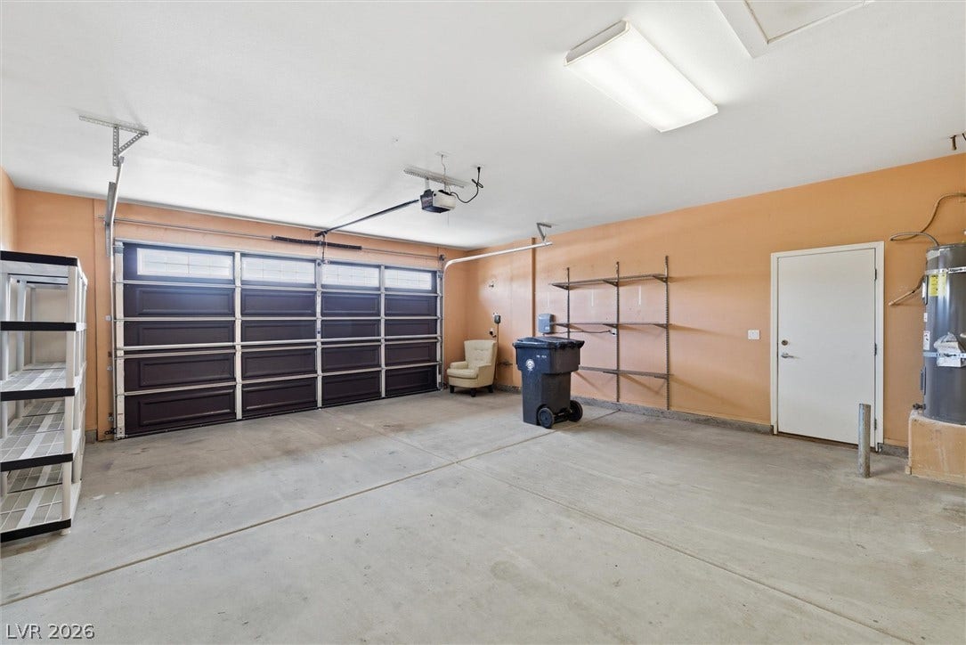4911 S Castello Way, Pahrump, NV 89061 An attached garage provides a clean concrete floor and direct interior entry.