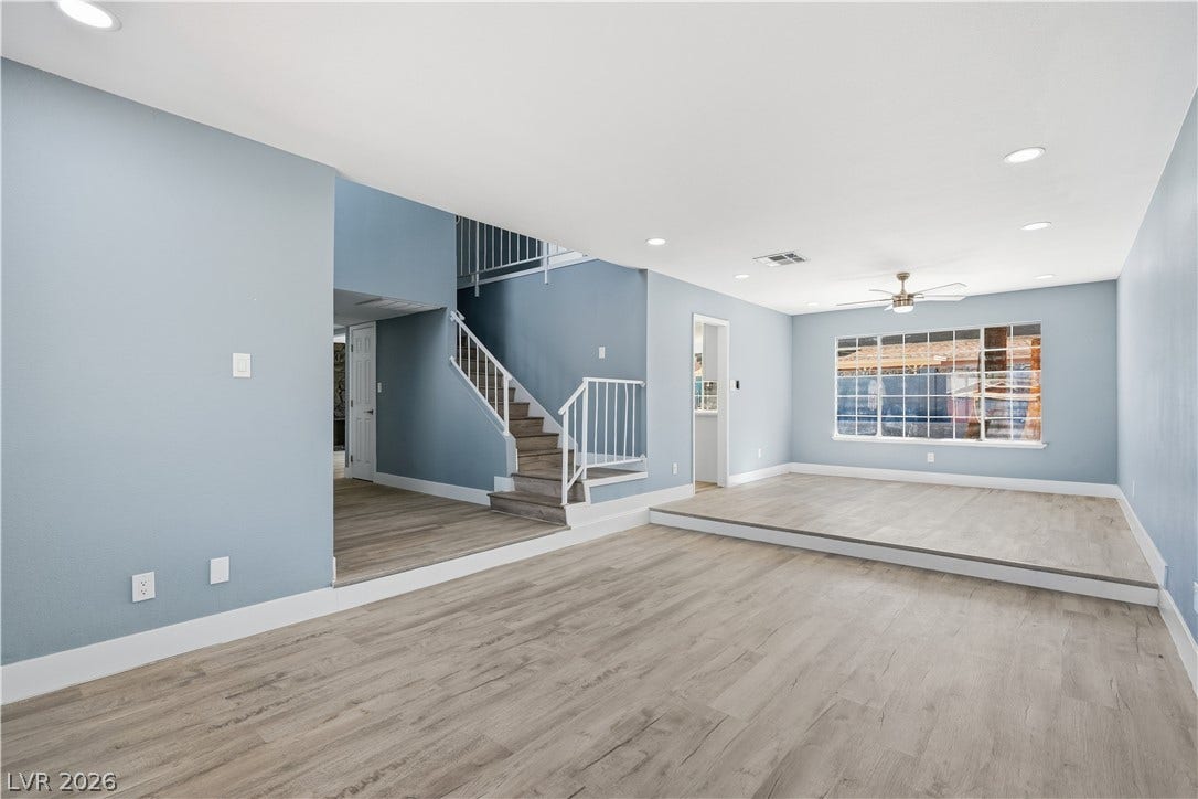 1707 Mapleton Lane, Las Vegas, NV 89119 An open living space features sunken floor details and modern recessed lighting throughout.