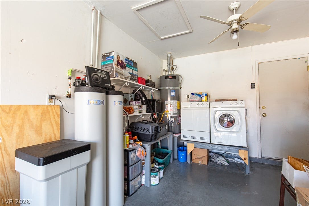 6705 Waterville Circle, Las Vegas, NV 89107 Stack style washer and dryer and water conditioner