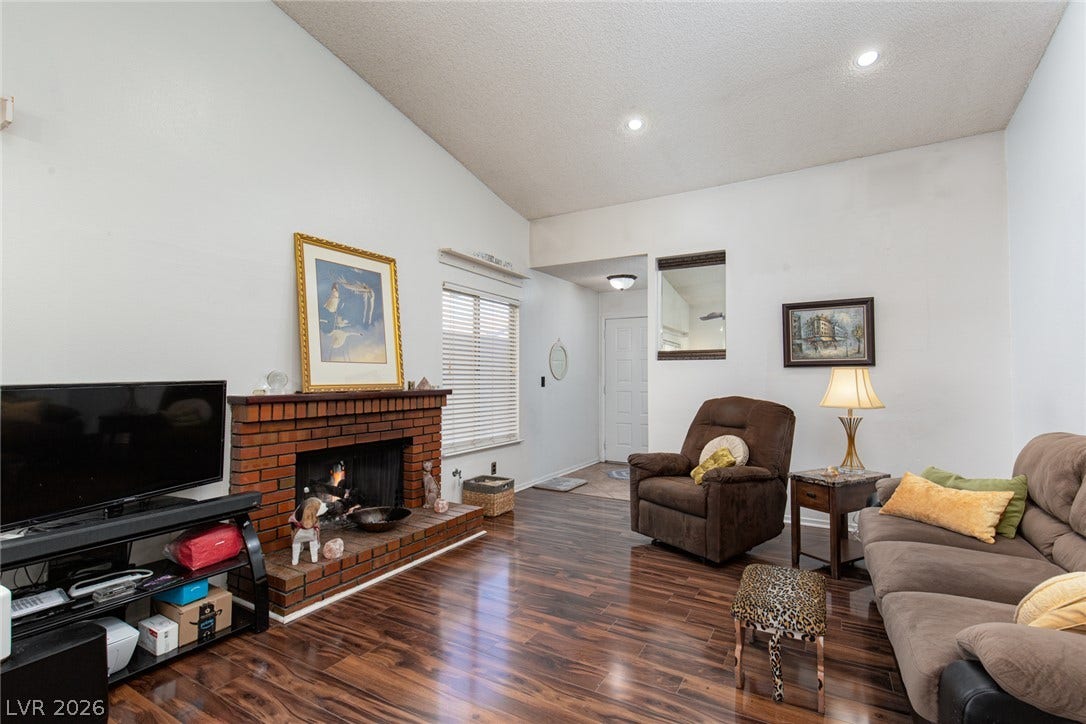 6705 Waterville Circle, Las Vegas, NV 89107 Gas fireplace and Pergo flooring
