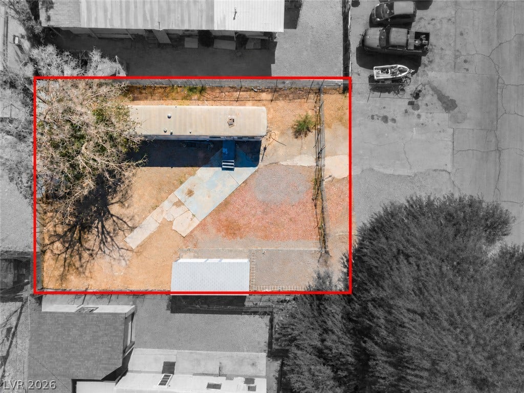 2268 Jo Anne Lane, Las Vegas, NV 89156 A fully fenced property offers endless potential with plenty of space for outdoor storage.