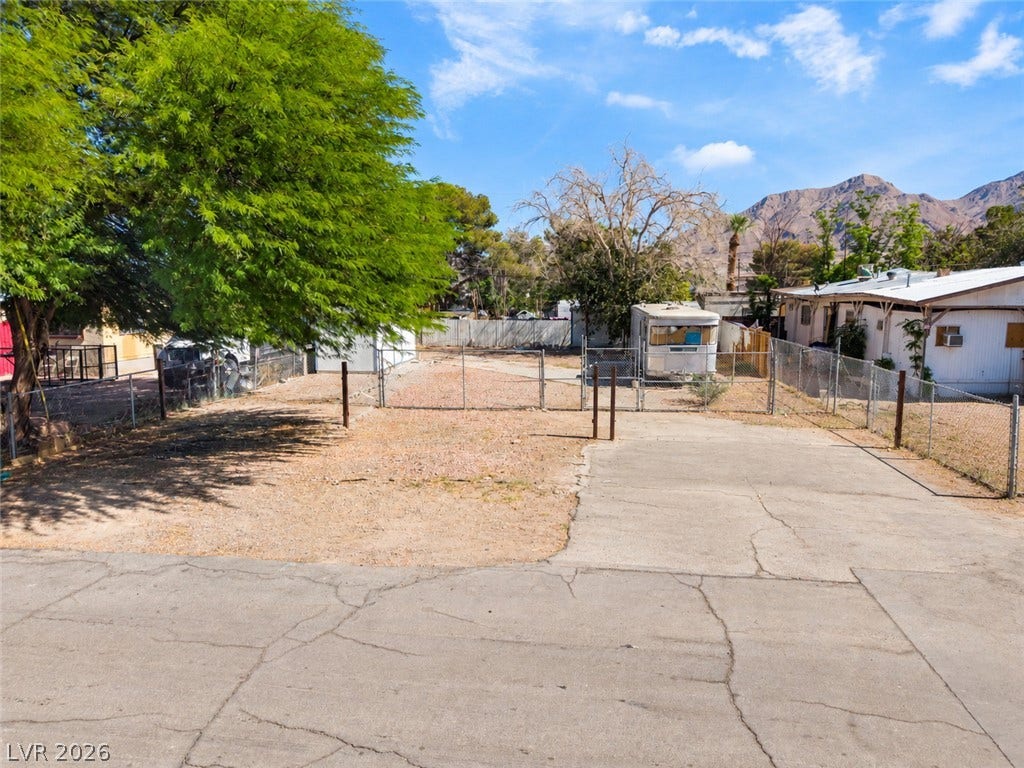 2268 Jo Anne Lane, Las Vegas, NV 89156 Fenced property outlines and native desert peaks create a scenic mountain backdrop.
