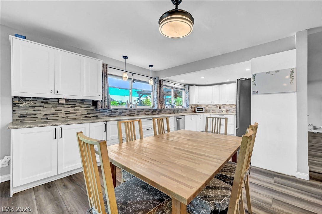 342 Fuente Drive, Henderson, NV 89014 Gleaming wood flooring runs throughout this functional culinary space boasting classic shaker-style cabinetry.