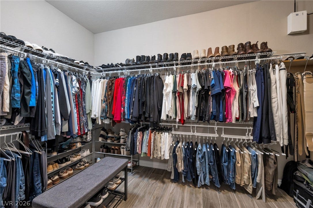 5652 Portage Lake Court, Las Vegas, NV 89130 Ample storage solutions define this practical and well-organized walk-in closet.