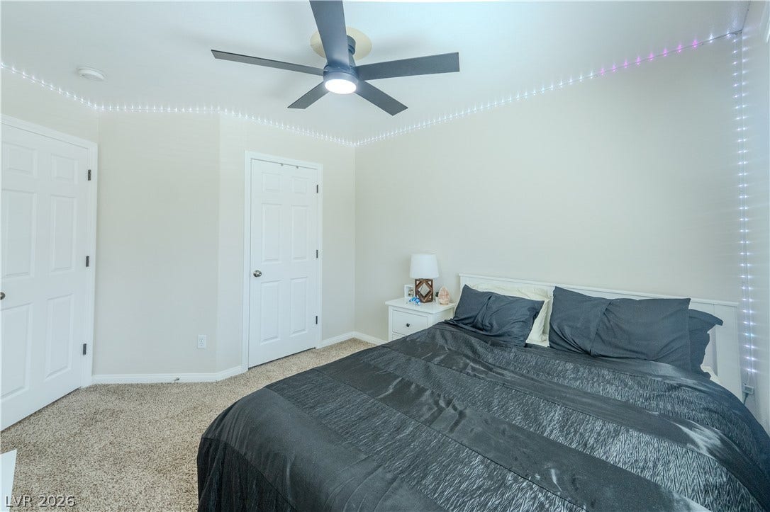 6007 Sonoma Station Avenue, Las Vegas, NV 89139 Soft carpeting underfoot and clean plaster walls create a cozy, comfortable atmosphere.