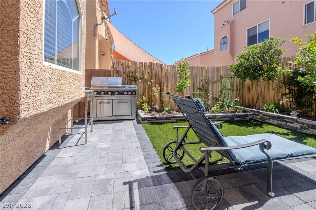 6007 Sonoma Station Avenue, Las Vegas, NV 89139 A private paved patio area provides a low-maintenance outdoor retreat.