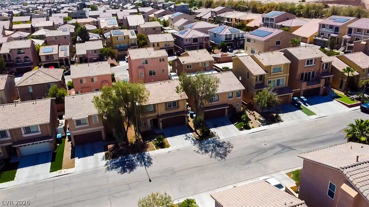 6007 Sonoma Station Avenue, Las Vegas, NV 89139 An aerial perspective captures this established residential neighborhood with tiled roofs and paved driveways.