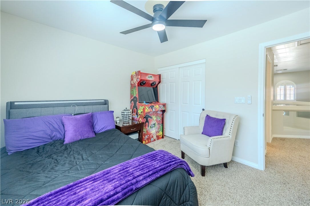 6007 Sonoma Station Avenue, Las Vegas, NV 89139 Soft carpeting underfoot runs throughout this comfortable bedroom space.
