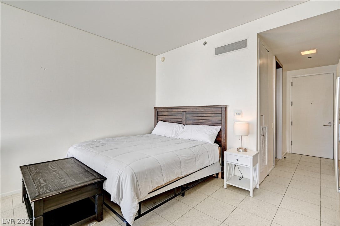 3722 Las Vegas Boulevard, #303, Las Vegas, NV 89158 Clean lines and light tile flooring define this quiet, comfortable sleeping space.