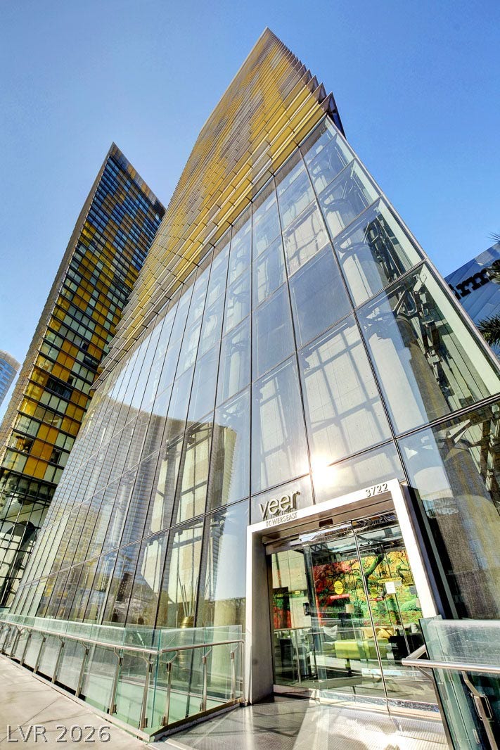 3722 Las Vegas Boulevard, #303, Las Vegas, NV 89158 Striking glass architecture defines the dramatic exterior entrance of this modern high-rise tower.
