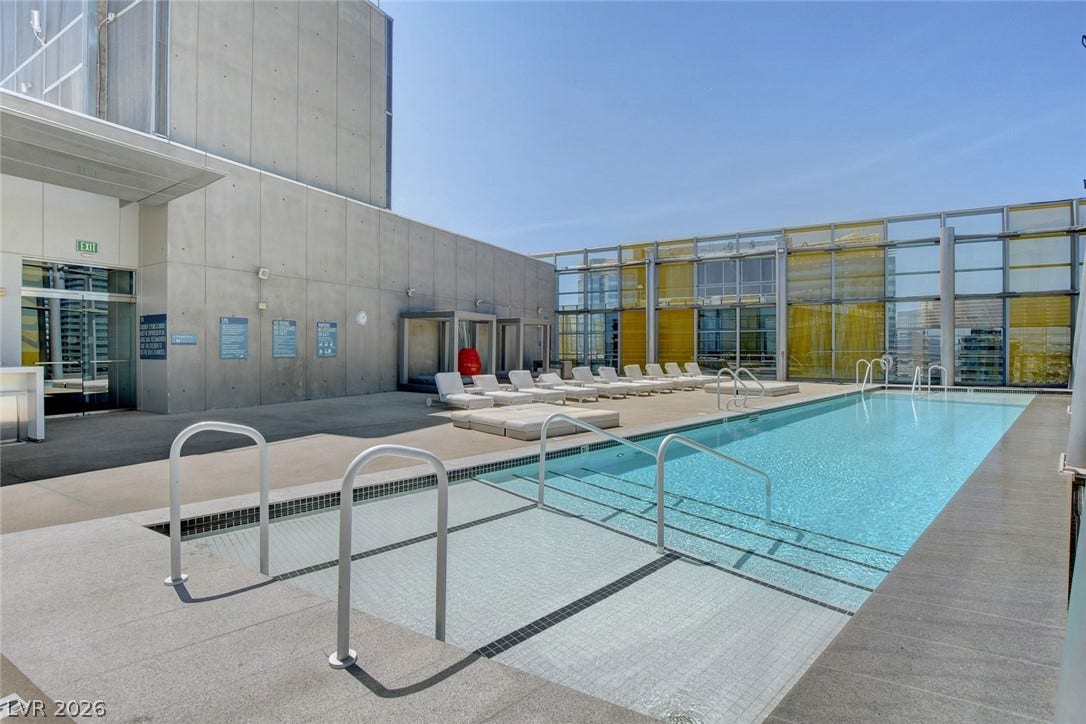 3722 Las Vegas Boulevard, #303, Las Vegas, NV 89158 Sleek architectural lines define this rooftop terrace featuring a sparkling lap pool and city views.
