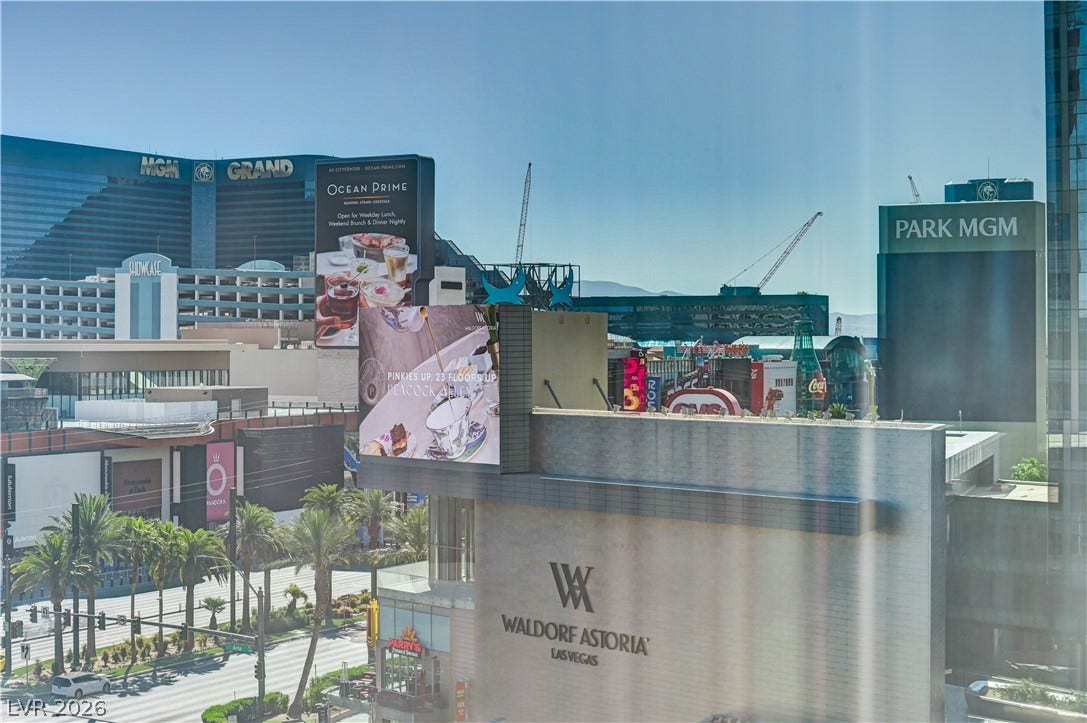 3722 Las Vegas Boulevard, #303, Las Vegas, NV 89158 Vibrant city views highlight the energy of this premier location.