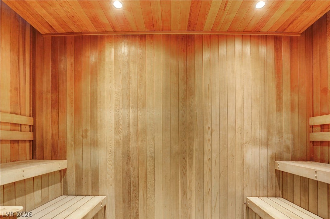 3722 Las Vegas Boulevard, #303, Las Vegas, NV 89158 Rich wood paneling and integrated bench seating define this relaxing private sauna.