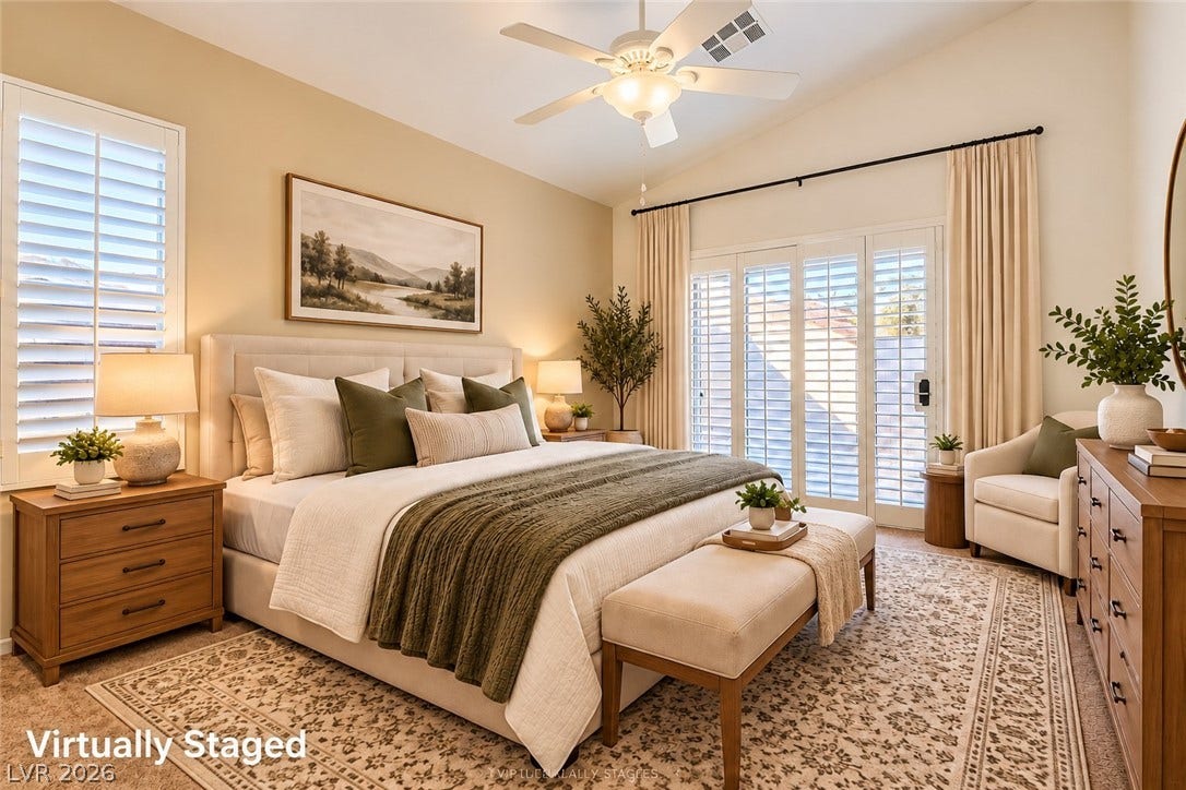 6729 Quarterhorse Lane, Las Vegas, NV 89148 Sliding glass doors open directly to the outdoors from this vaulted primary bedroom. *Virtually Staged*