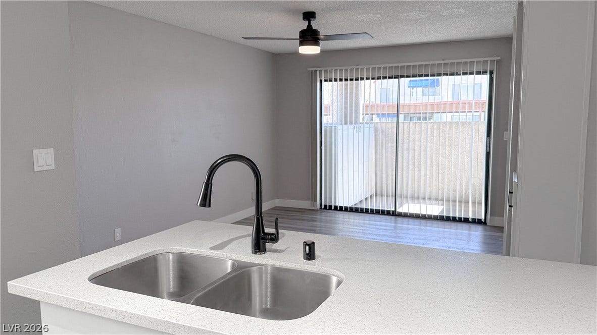 4321 Gannet Circle, #199, Las Vegas, NV 89103 Sliding glass doors open directly to a private outdoor patio space.