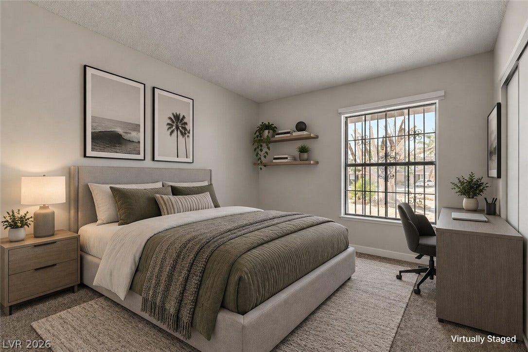 4442 Eureka Circle, Las Vegas, NV 89103 Plentiful natural light fills this bedroom through a wide window overlooking the property grounds.