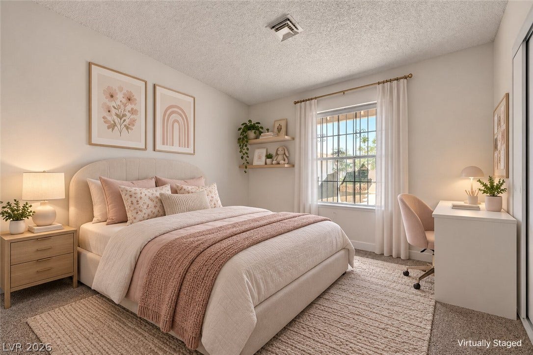 4442 Eureka Circle, Las Vegas, NV 89103 Plush carpeting and a classic window frame this comfortable bedroom space.