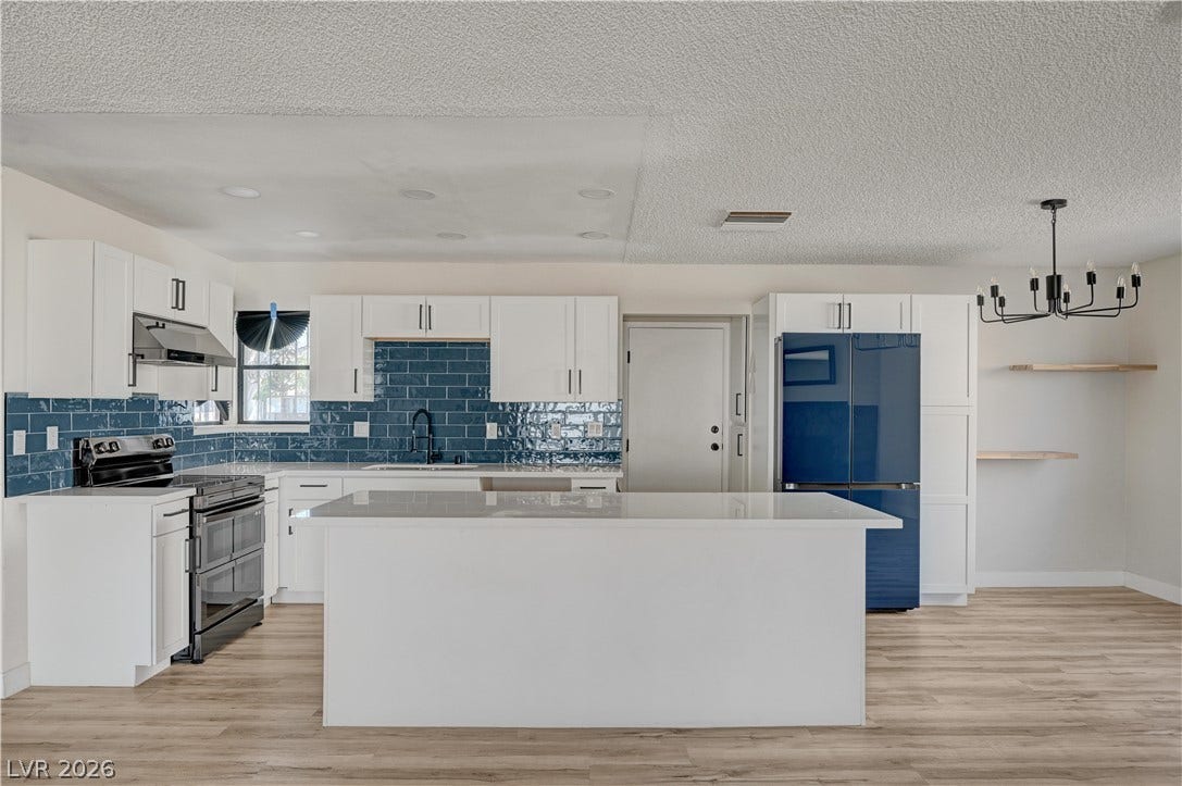 4442 Eureka Circle, Las Vegas, NV 89103 Clean lines and durable finishes define this updated culinary space complete with central island.