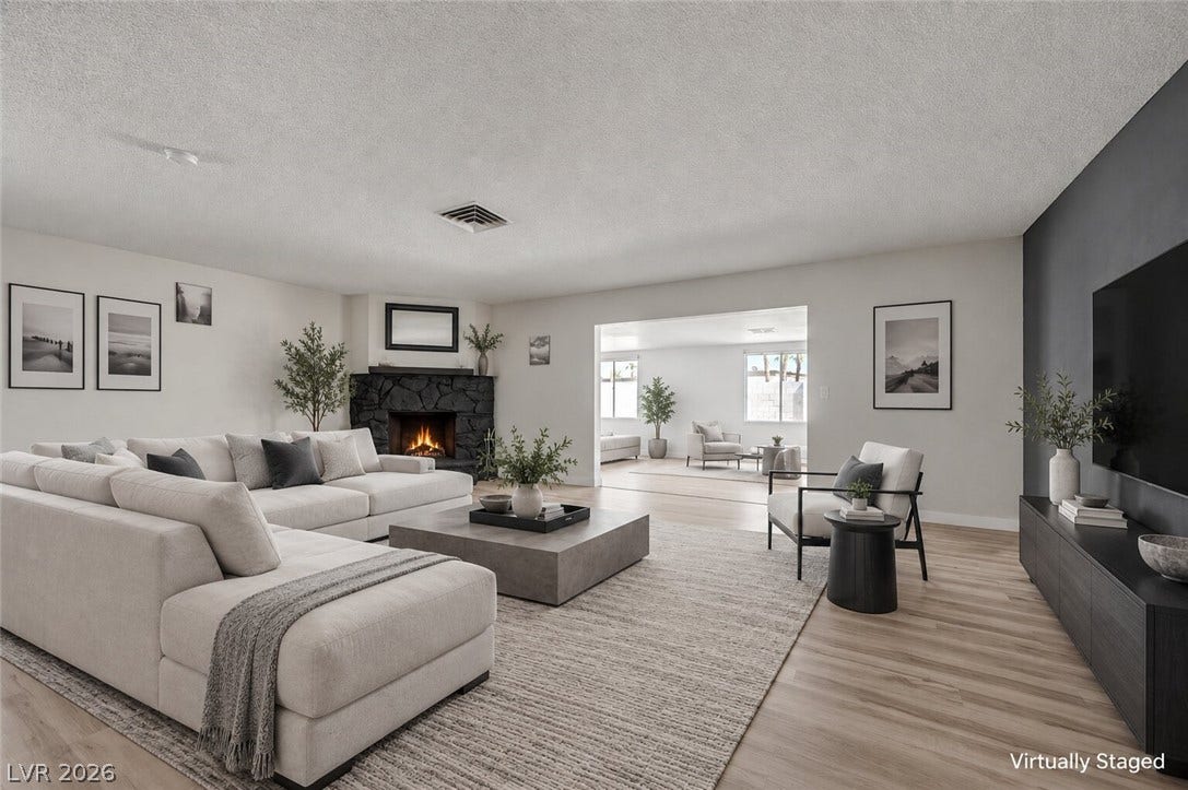4442 Eureka Circle, Las Vegas, NV 89103 An open floorplan seamlessly connects the airy living area to the adjacent dining space.