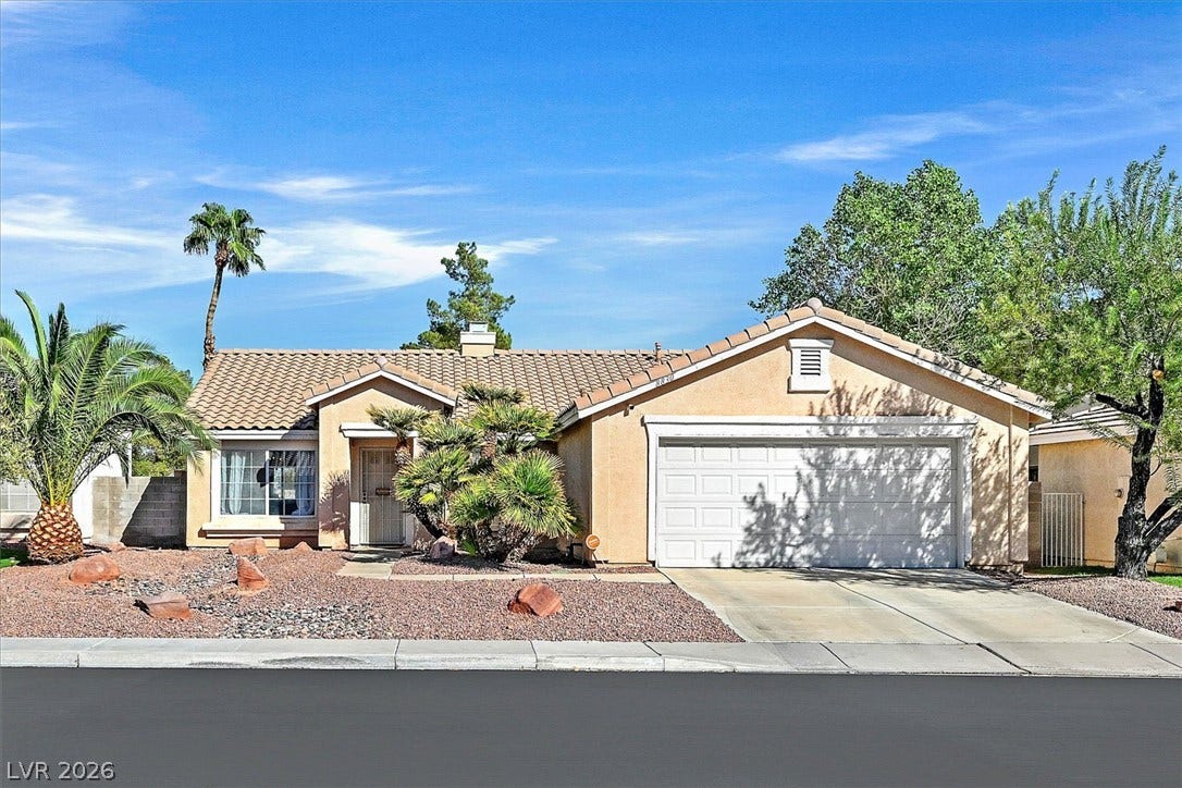 8830 Haviland Road, Las Vegas, NV 89123 Desert landscaping and a tile roof define the facade of this classic ranch-style residence.