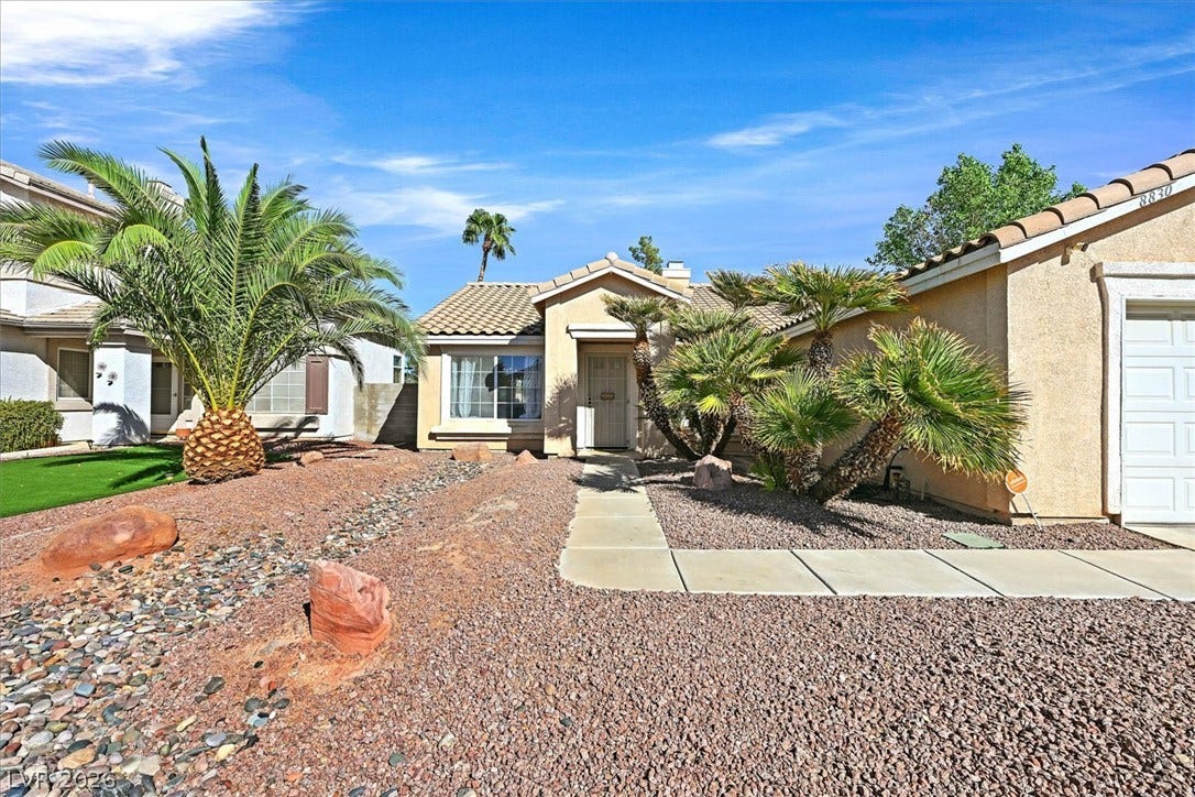 8830 Haviland Road, Las Vegas, NV 89123 Desert landscaping and a tiled roof define the exterior of this single-story home.