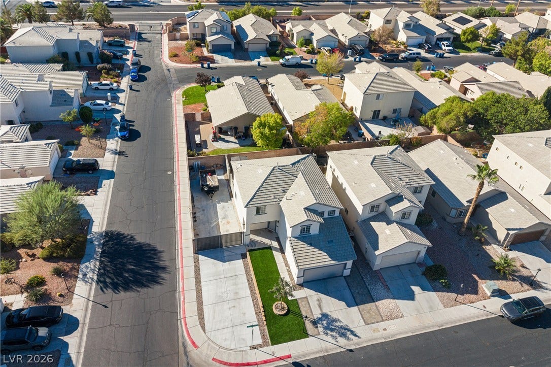 4817 Whispering Spring Avenue, Las Vegas, NV 89131 Neat stucco homes sit tucked along paved streets in this peaceful suburban neighborhood.