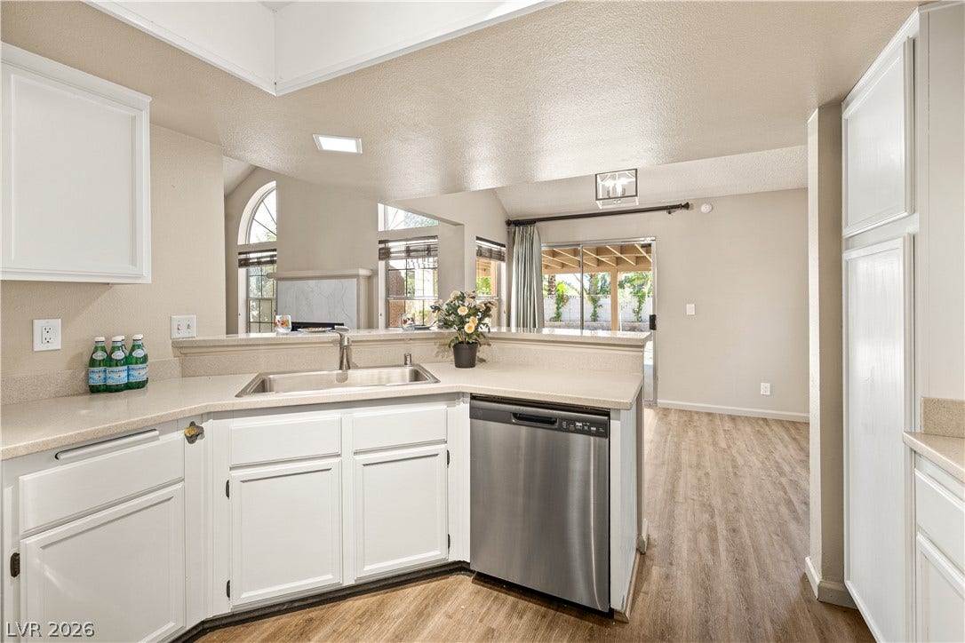 325 Manor Street, Las Vegas, NV 89145 An open floorplan connects this kitchen to the adjacent living spaces.