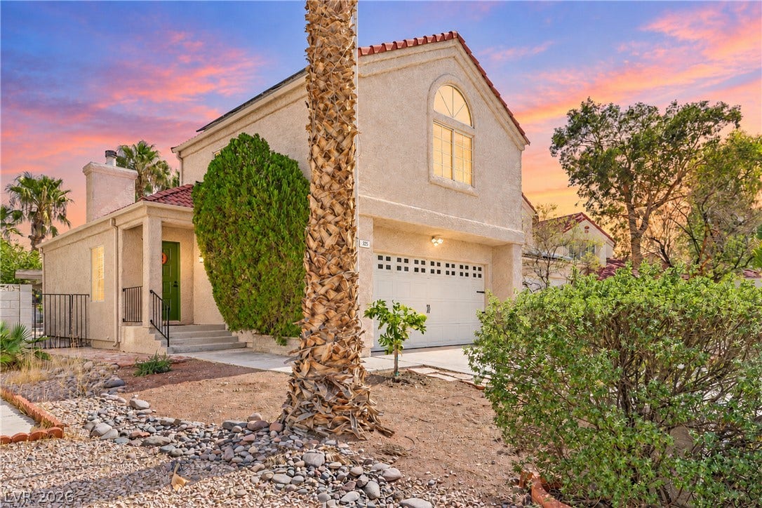 325 Manor Street, Las Vegas, NV 89145 Spanish tile accents and a stucco exterior define this multi-level home's classic architectural appeal.