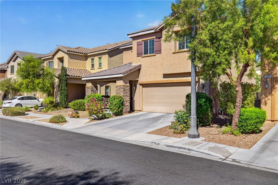 8112 Winterfell Place, Las Vegas, NV 89166 Attractive stucco exteriors with stone accents define this inviting two-story neighborhood home.
