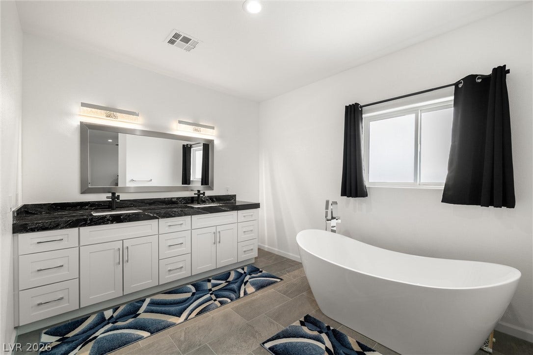 1601 W Calvada Boulevard, Pahrump, NV 89048 Contemporary bathroom complete with a deep soaking tub.