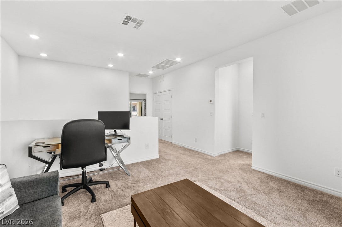 A well-lit and comfortable area perfect for both relaxation and productivity.