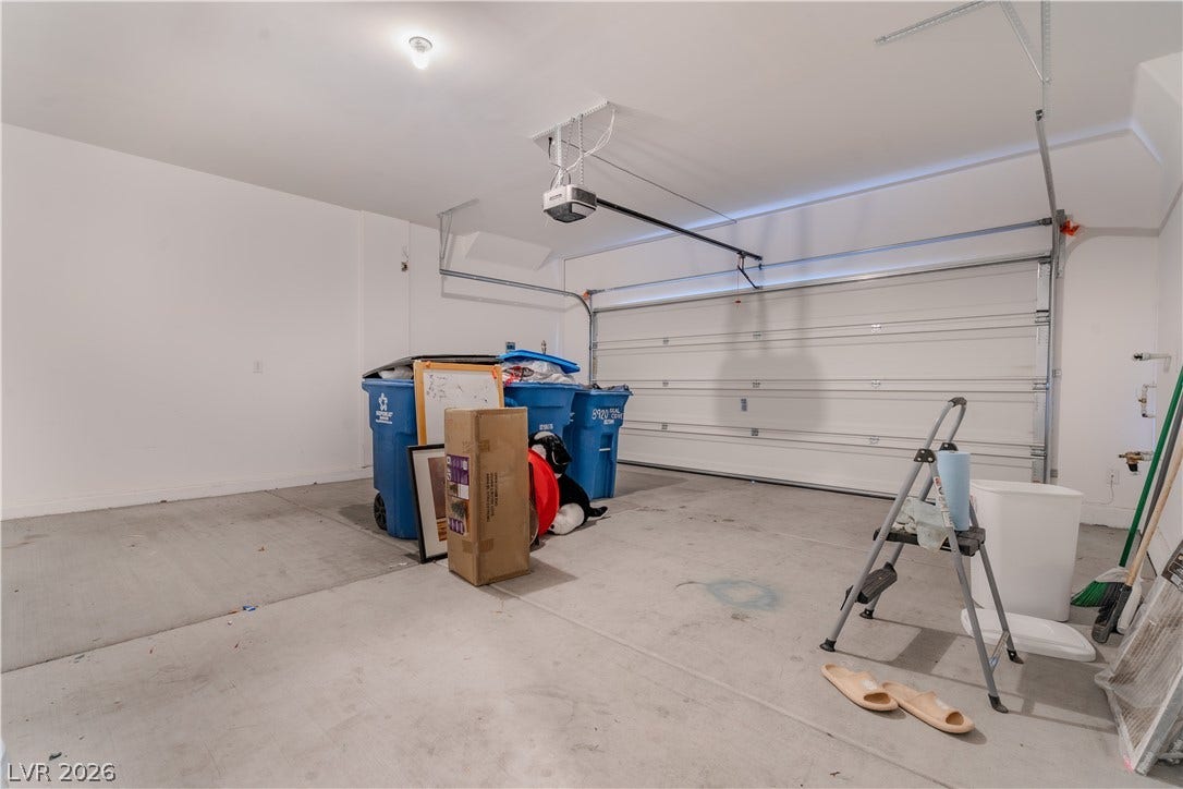 8920 Seal Cove Street, Las Vegas, NV 89178 An attached garage provides direct home access and durable concrete floors.