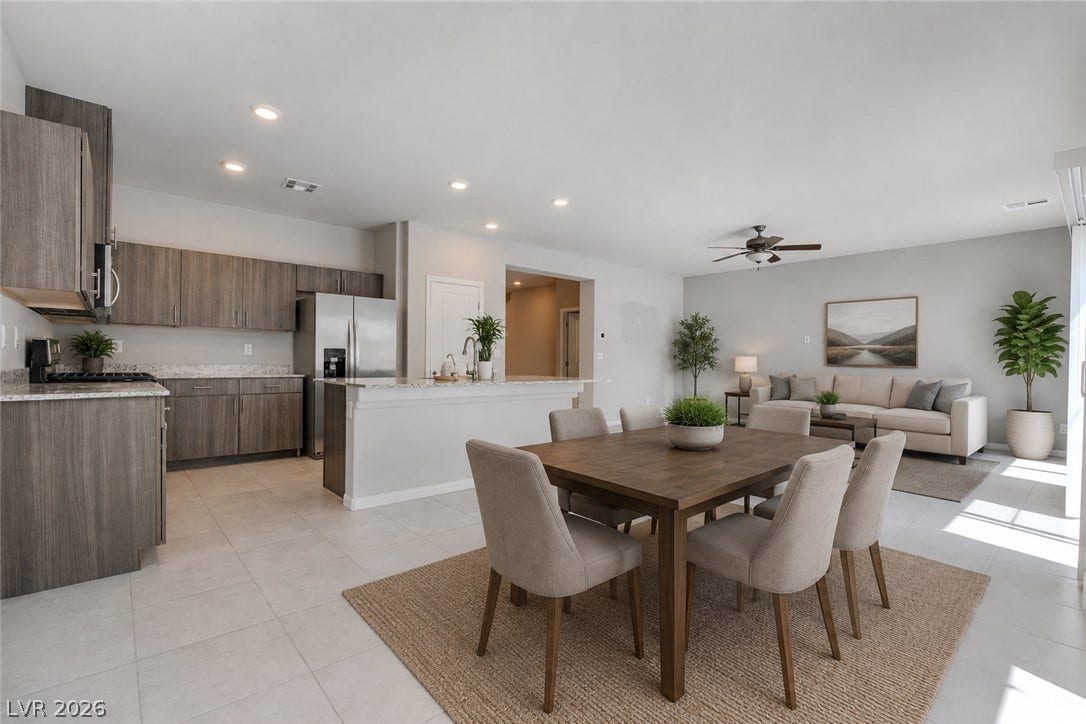 8920 Seal Cove Street, Las Vegas, NV 89178 An open floorplan seamlessly connects the dining space, kitchen, and living area.