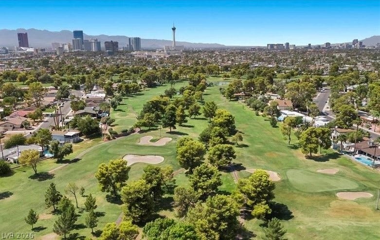 Golf course community living with city views and desert mountains.