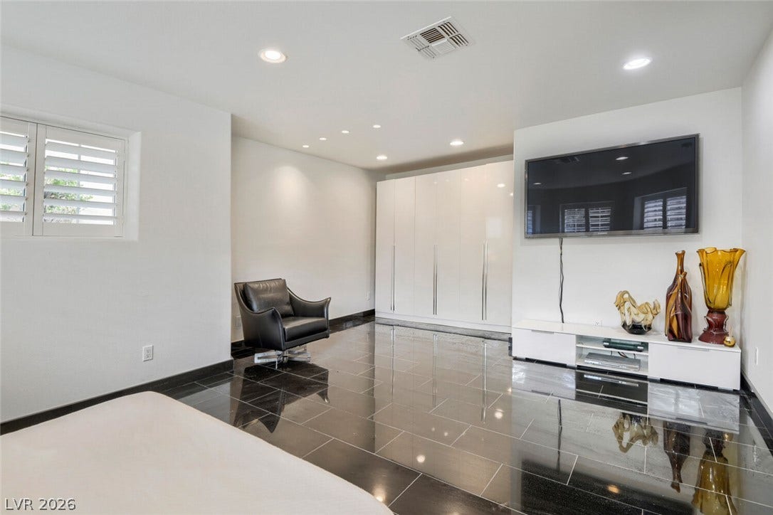 2010 Shenley Court, Las Vegas, NV 89117 Polished tile flooring and recessed lighting define this modern living space.