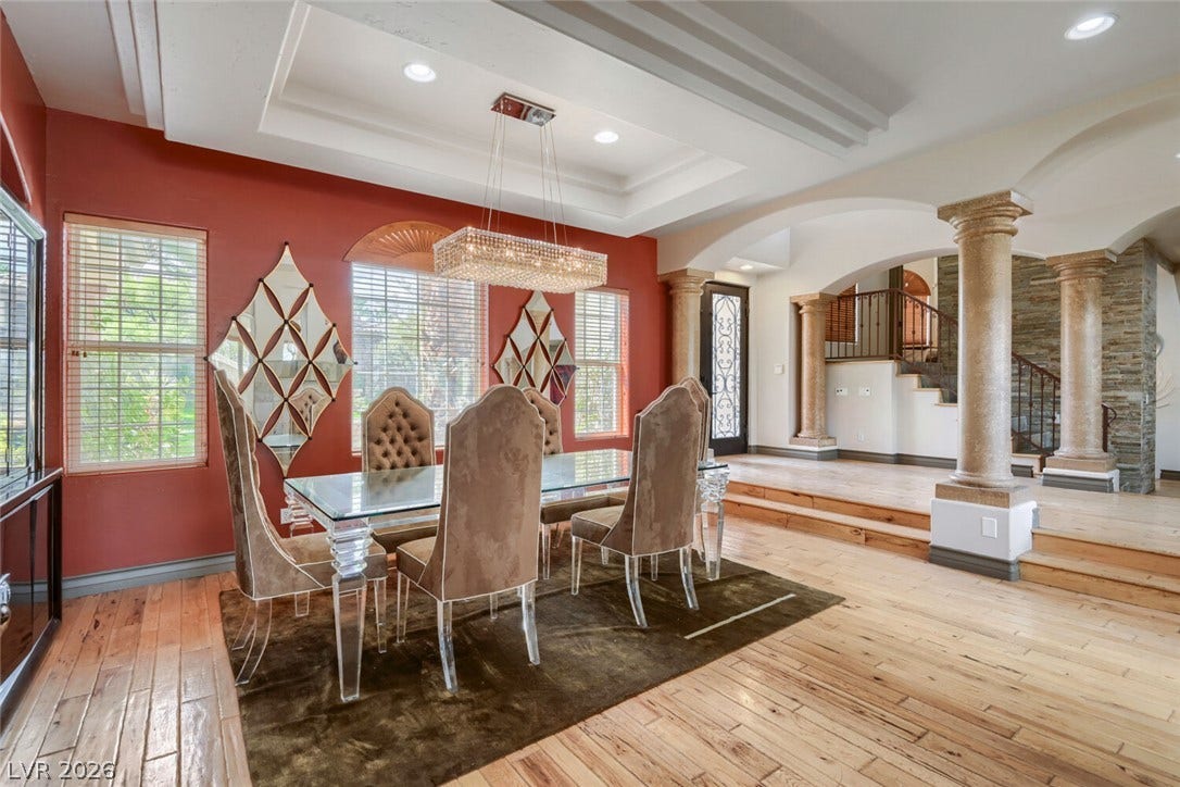 2010 Shenley Court, Las Vegas, NV 89117 Gleaming hardwood floors and a recessed ceiling elevate this formal dining space.