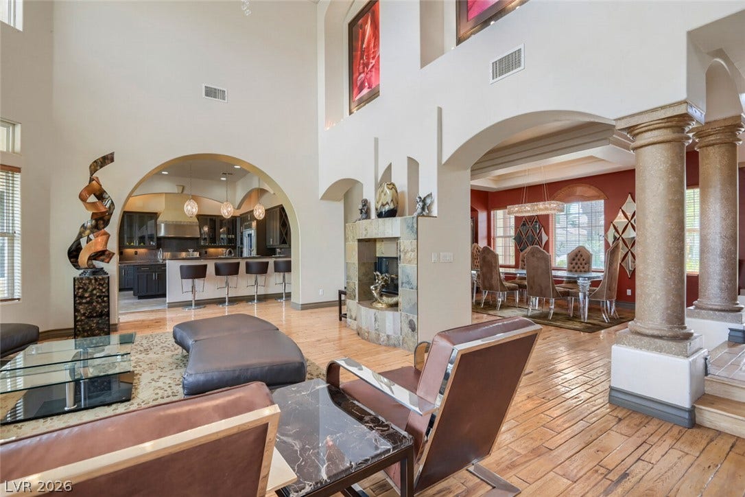 2010 Shenley Court, Las Vegas, NV 89117 Soaring ceilings and arched passageways define this airy, open-concept interior layout.
