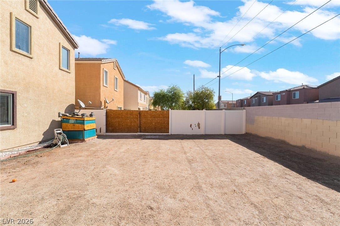 6275 Felicitas Avenue, Las Vegas, NV 89122 A spacious, enclosed backyard awaits your creative landscaping ideas.