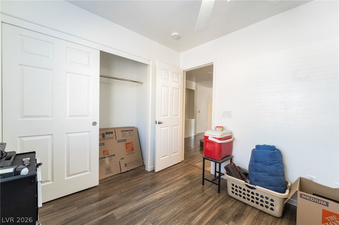 6275 Felicitas Avenue, Las Vegas, NV 89122 Gleaming wood-look floors anchor this versatile room complete with a built-in closet.