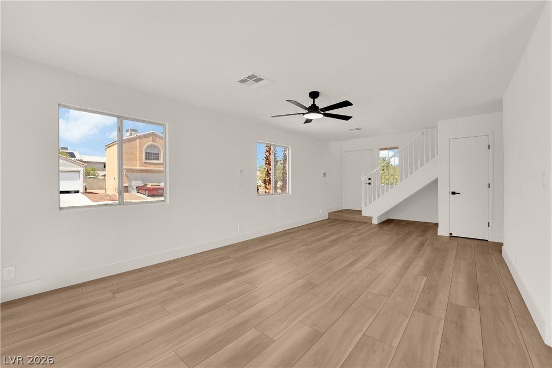 Smooth wood flooring and clean walls create an inviting foundation for personalized living.