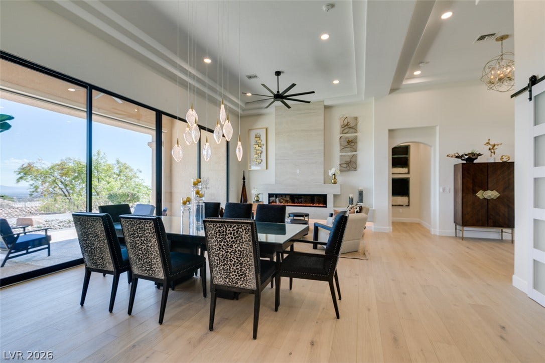 2532 Faiss Drive, Las Vegas, NV 89134 An open floorplan connects the dining space with the living area beyond.