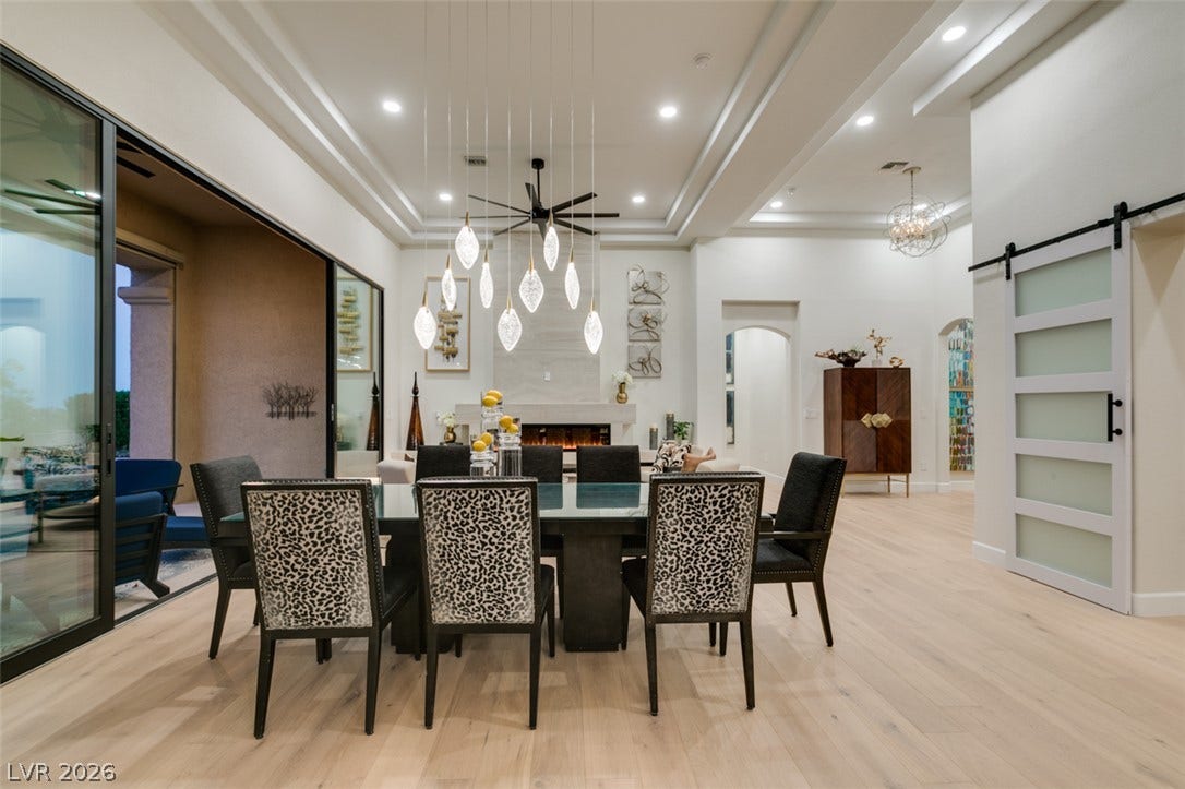 2532 Faiss Drive, Las Vegas, NV 89134 An open floorplan connects the refined dining space to the adjacent living areas.