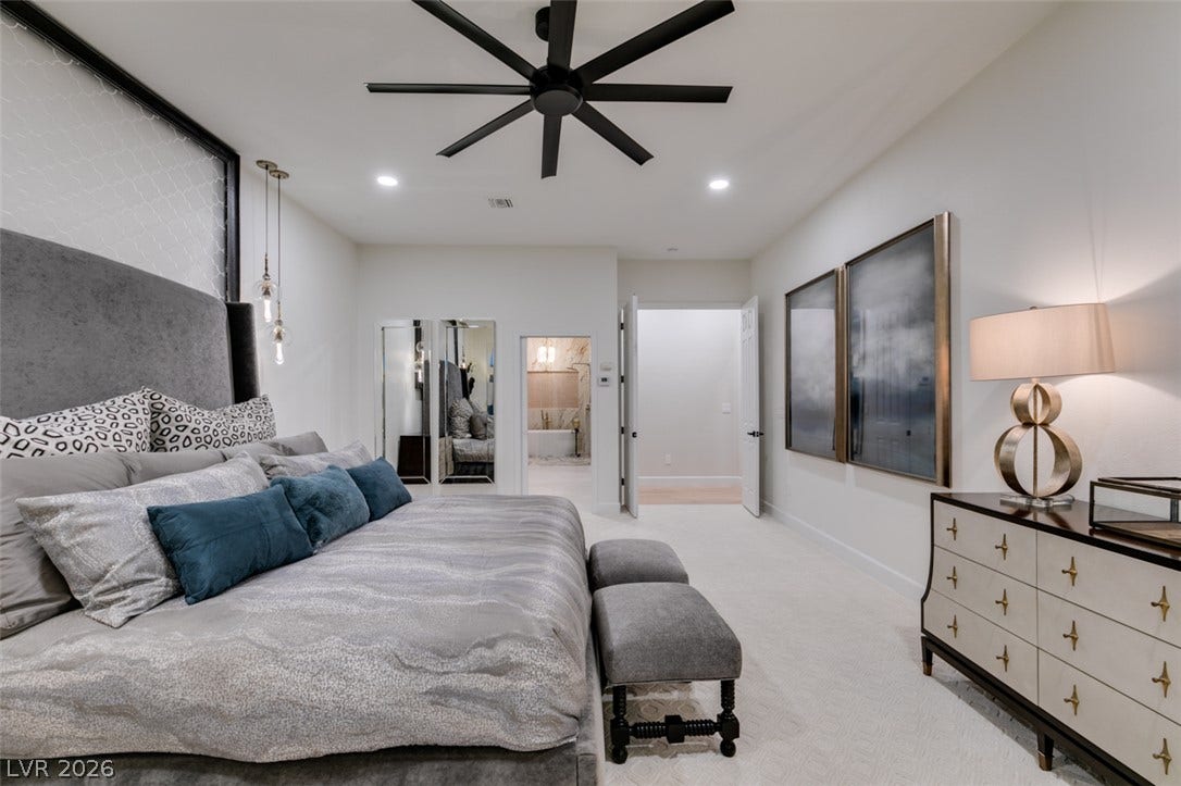 2532 Faiss Drive, Las Vegas, NV 89134 Smooth carpeting and high ceilings define this serene private sanctuary.