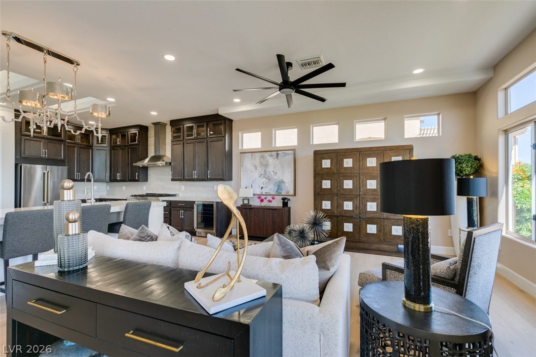 2532 Faiss Drive, Las Vegas, NV 89134 An open floor plan seamlessly connects the comfortable living area to a modern kitchen.