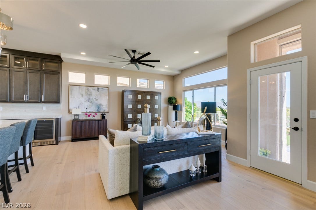 2532 Faiss Drive, Las Vegas, NV 89134 Clean lines and warm hardwood floors define this inviting, open-concept main living space.