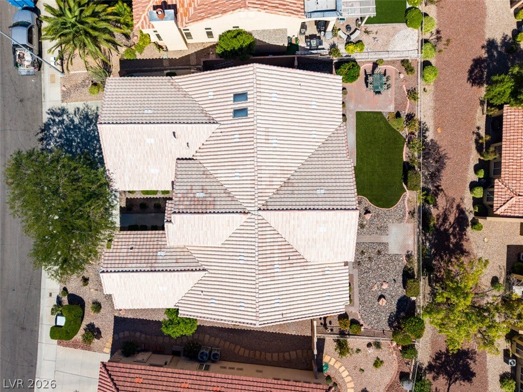 2532 Faiss Drive, Las Vegas, NV 89134 A bird's-eye view highlights the tiled roofline and structured backyard design.