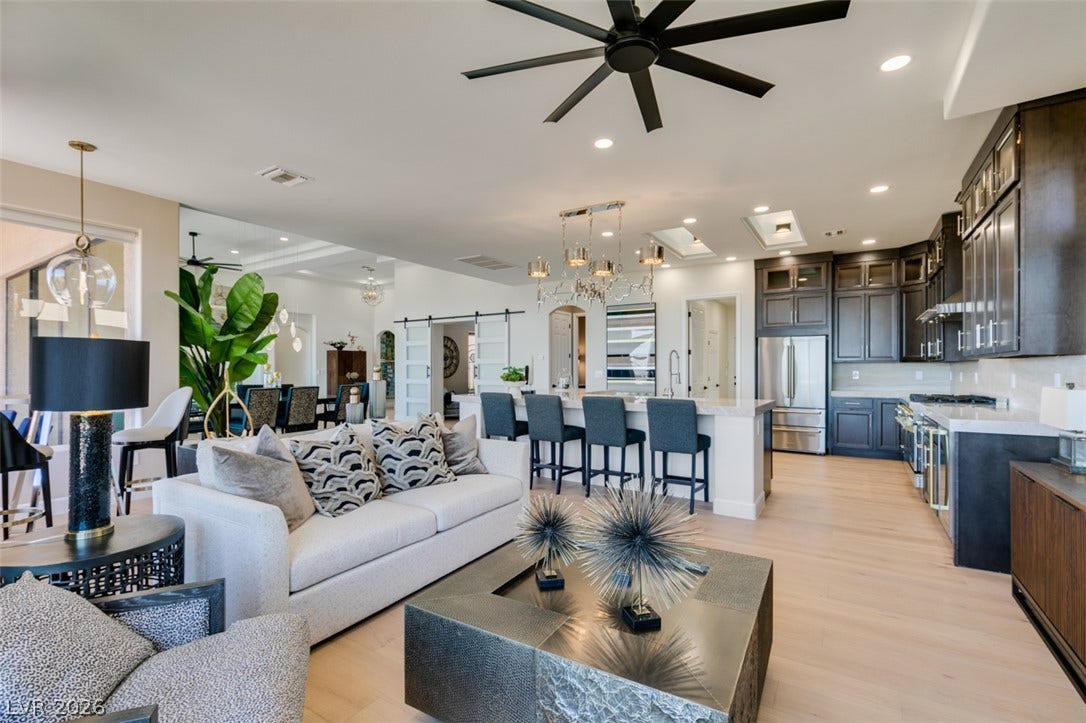 2532 Faiss Drive, Las Vegas, NV 89134 An open floorplan seamlessly connects the airy living area with the modern kitchen.