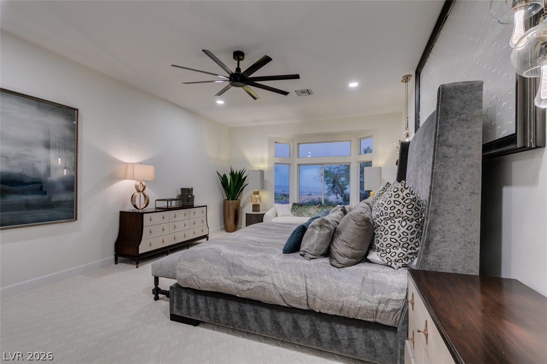 2532 Faiss Drive, Las Vegas, NV 89134 Plush carpeted flooring and a deep bay window highlight this tranquil sleeping retreat.