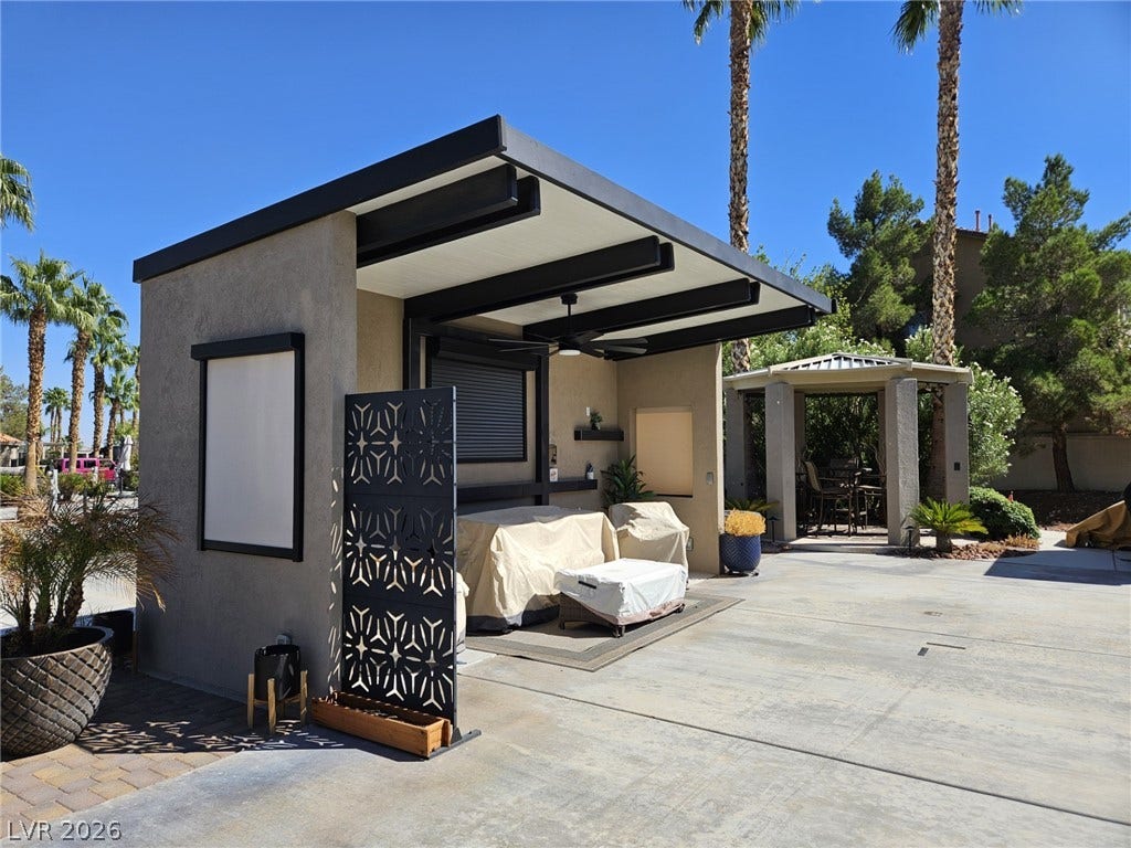 8175 Arville Street, #186, Las Vegas, NV 89139 An outdoor pavilion with a modern cantilevered roof overlooks the spacious concrete patio.
